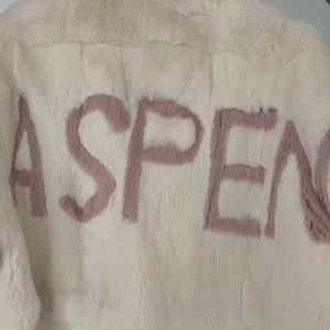 Rabbit fur long coat with Aspen logo on back. Deep patch pockets and fully lined